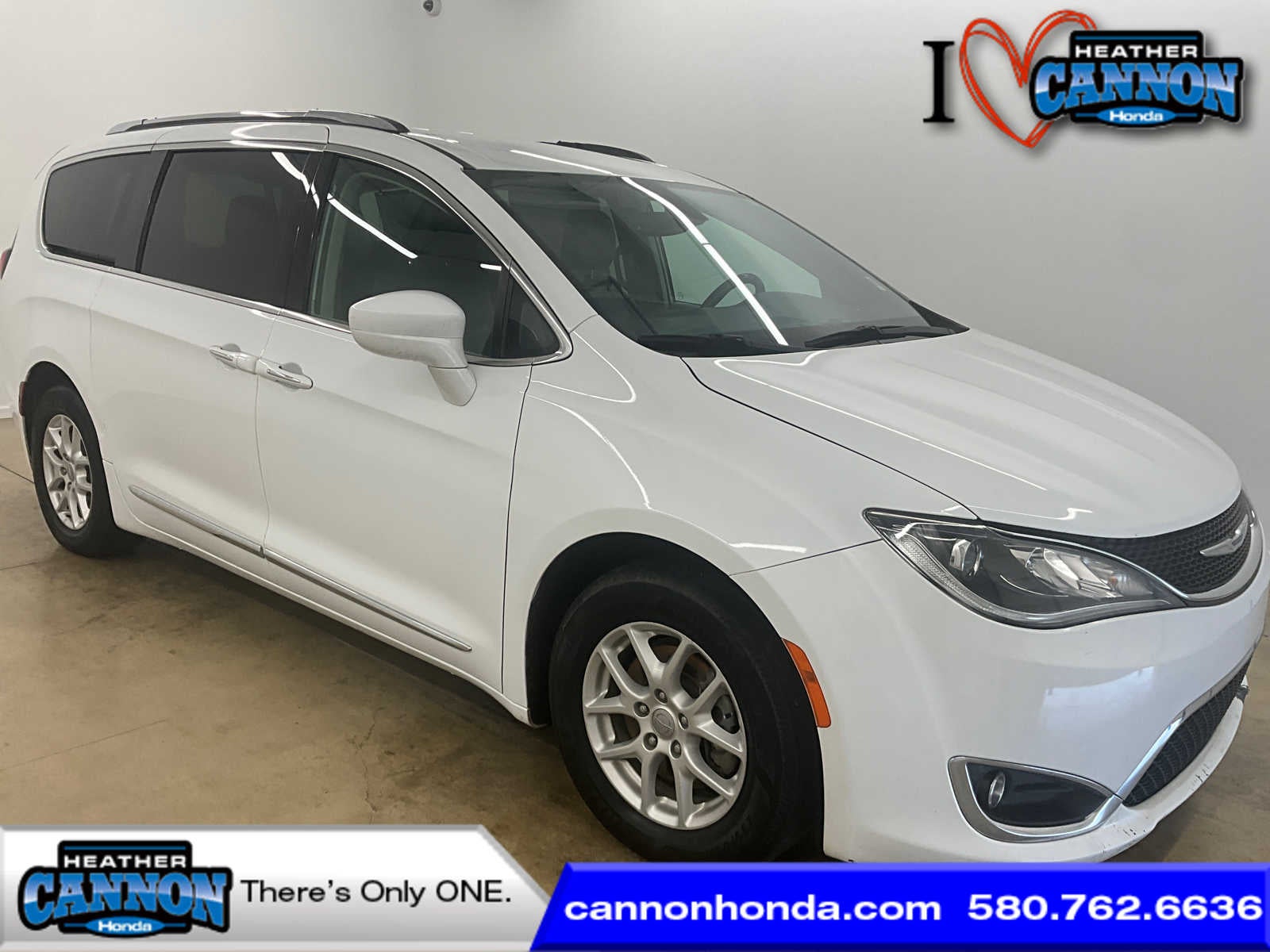 2020 Chrysler Pacifica Touring L in Bright White Clearcoat — front three-quarter view