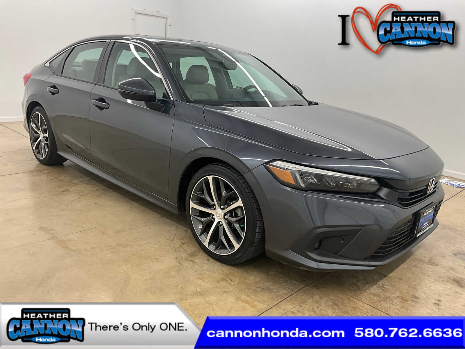 2023 Honda Civic Touring in Meteorite Gray Metallic — front three-quarter view