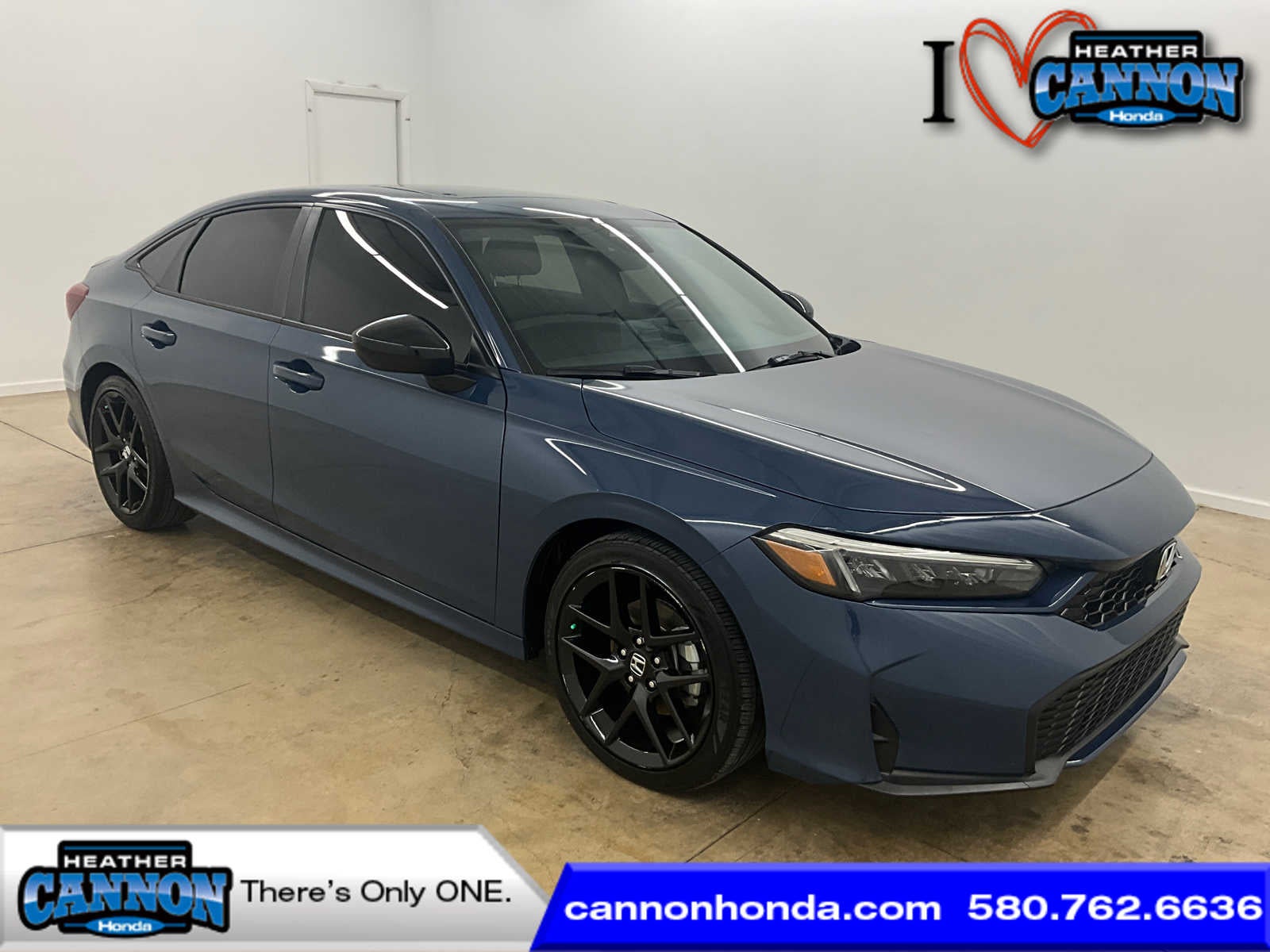 2025 Honda Civic Hybrid Sport in Blue Lagoon Pearl — front three-quarter view