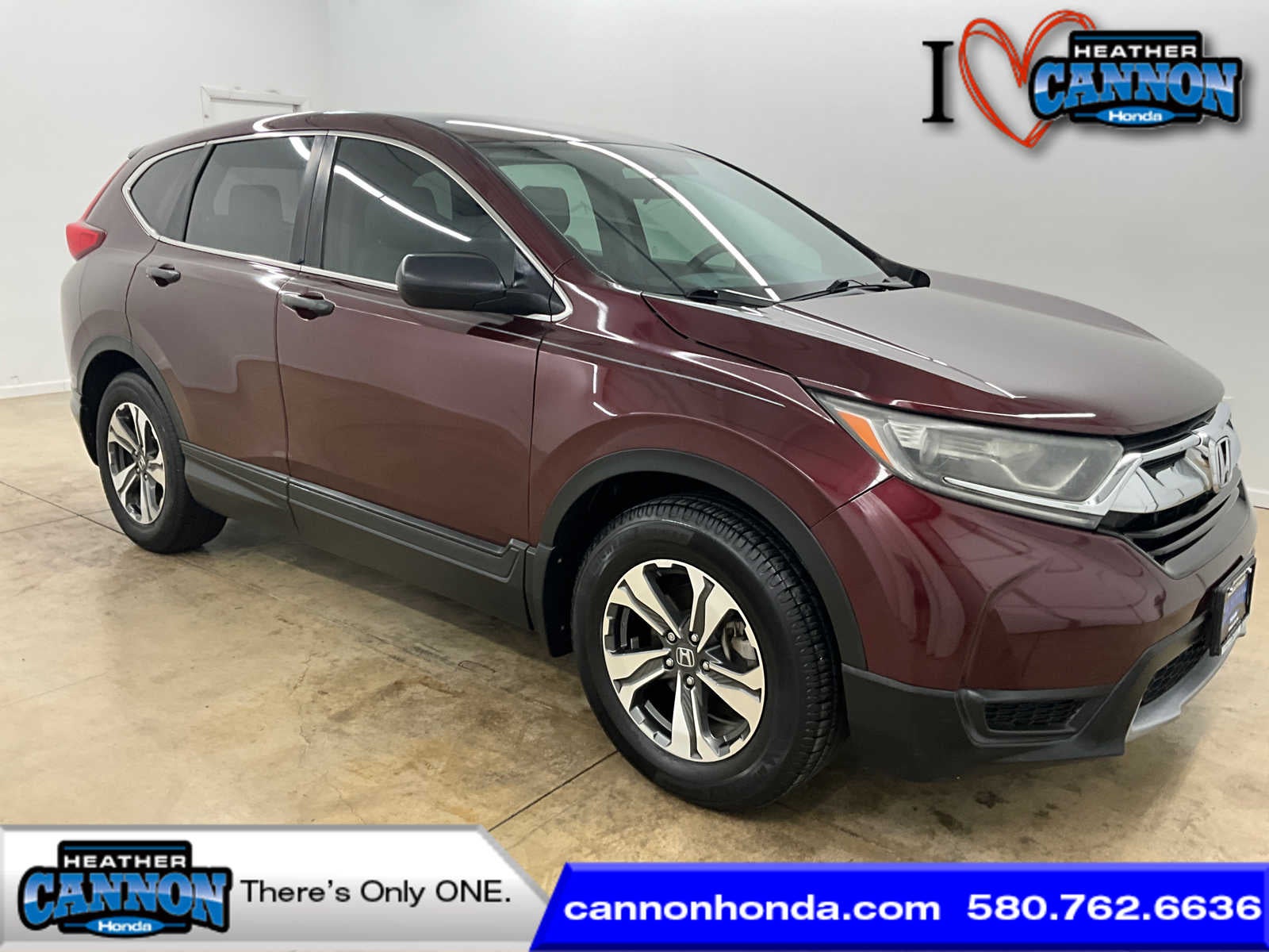 2018 Honda CR-V LX in Basque Red Pearl II — front three-quarter view