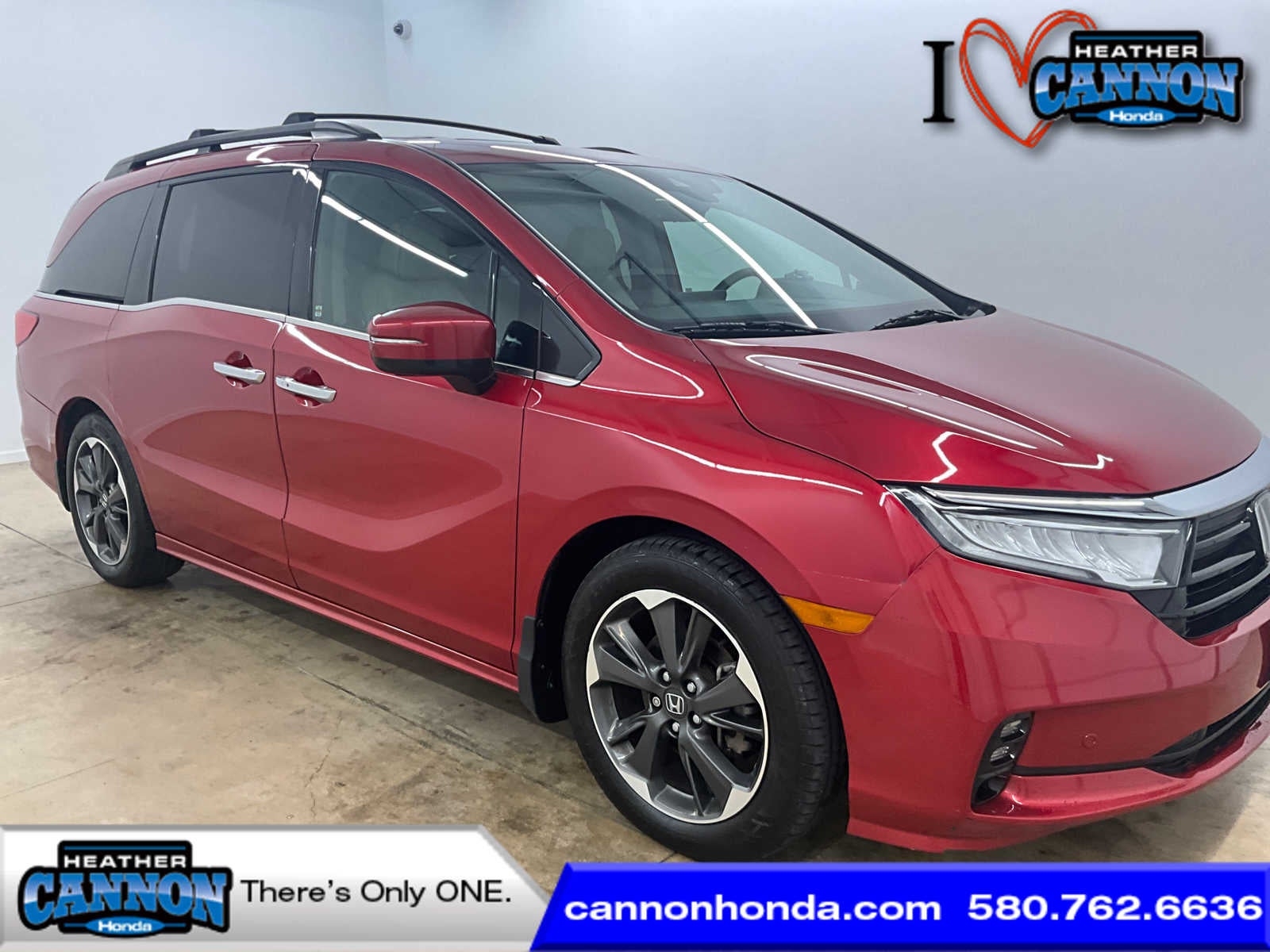 2023 Honda Odyssey Elite in Radiant Red Metallic II — front three-quarter view